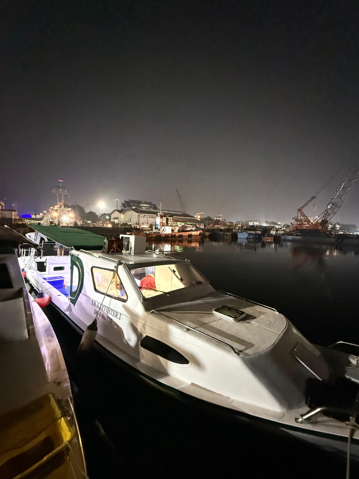 Crewboat on station at night